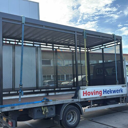 Rookoverkapping model Hagen 25 Onze rookabri - rokersoverkapping model Hagen, 5x2m op transport naar Amersfoort. ROC Midden Nederland.