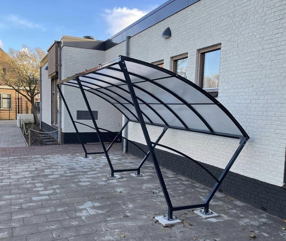 Ontdek de duurzame fietsenstallingen van SKWshop 6 fietsenoverkapping modeol Velo